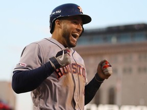 George Springer #4 of the Houston Astros celebrates his fifth inning inside the park home home run while playing the Detroit Tigers at Comerica Park on May 14, 2019 in Detroit, Michigan.