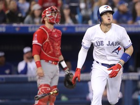 Cavan Biggio of the Toronto Blue Jays watches as he hits a two-run home run in the eighth inning during MLB game action against the Los Angeles Angels at Rogers Centre on June 17, 2019 in Toronto. (Tom Szczerbowski/Getty Images)