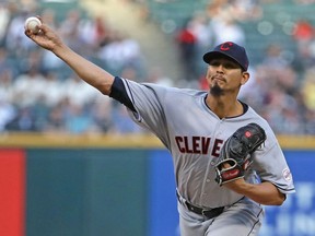 Starting pitcher Carlos Carrasco of the Cleveland Indians delivers the ball against the Chicago White Sox at Guaranteed Rate Field on May 30, 2019 in Chicago, Illinois.