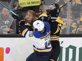 Brayden Schenn #10 of the St. Louis Blues hits Zdeno Chara of the Boston Bruins during the second period in Game 5 of the NHL Stanley Cup Final at TD Garden in Boston (Patrick Smith/Getty Images)