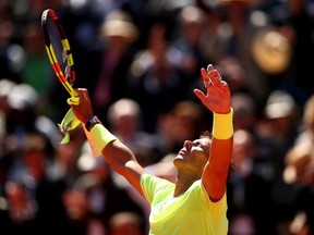 Rafael Nadal of Spain celebrates victory during his mens singles semi-final match against Roger Federer of Switzerland during Day thirteen of the 2019 French Open at Roland Garros on June 07, 2019 in Paris, France.