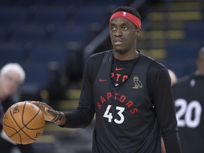 Toronto Raptors' Pascal Siakam dribbles at practice on Wednesday in Oakland. (THE CANADIAN PRESS)