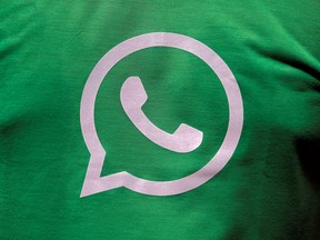 A logo of WhatsApp is pictured on a T-shirt worn by a WhatsApp-Reliance Jio representative during a drive by the two companies to educate users, on the outskirts of Kolkata, India, October 9, 2018. REUTERS/Rupak De Chowdhuri/File Photo