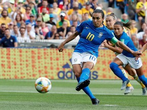 Brazil's Marta scores their first goal from the penalty spot in Brazil's game against Australia, June 13, 2019. (REUTERS/Jean-Paul Pelissier/File Photo)