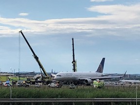 The United Airlines flight 627 plane is pictured disabled on the runway after its tires blew when it landed in New Jersey's Newark airport, U.S., June 15, 2019. REUTERS/Ed Tobin