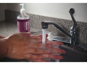 A September 7, 2009 photo illustration shows a woman washing her hands in Chevy Chase, Maryland. In response to concerns that widespread use of antibacterial soaps may be fueling a rise in superbugs, manufacturers will soon have to meet stricter requirements showing long-term safety, US regulators said December 16, 2013. Antibacterial soap-makers would also have to show that their products are more effective than plain soap at preventing illness and the spread of infections, said the proposed rule by the US Food and Drug Administration. The products typically contain the chemicals triclosan and triclocarban, "which may carry unnecessary risks given that their benefits are unproven," the FDA said in a statement.