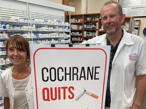TWO Pharmacy pharmacists Rose Chapman and Kelly Kimmett, classmates from 1978 University of Alberta Faculty of Pharmacy. Kelly Kimmett and his coworkers at Two Pharmacy in Cochrane are hosting Cochrane QUITS, an event to encourage smokers in the community to quit smoking cigarettes, even for just one day. Submitted photo