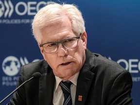 Canadian Minister for International Trade Diversification Jim Carr addresses a press conference at the OECD headquarters following a WTO reform meeting in Paris on May 23, 2019 as part of the OECD Forum annual meeting.
