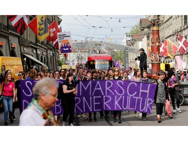Women take part in a nation-wide women's strike for wage parity, on June 14, 2019 in Swiss capital Bern.