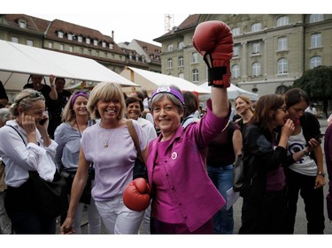 National Councillor Margret Kiener-Nellen (C) takes part in a nation-wide women's strike for wage parity, on June 14, 2019 in Swiss capital Bern.