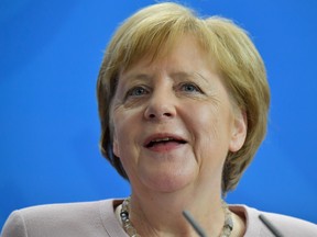 German Chancellor Angela Merkel addresses a press conference with Ukraine's new President on his first official visit to Germany on June 18, 2019 at the Chancellery in Berlin. (Tobias SCHWARZ / AFP)