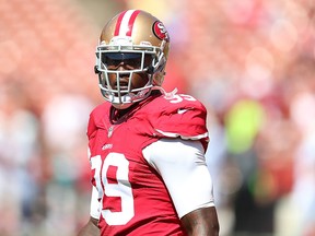 Aldon Smith of the San Francisco 49ers looks on during warm-ups against the Indianapolis Colts at Candlestick Park on September 22, 2013 in San Francisco. (Jed Jacobsohn/Getty Images)
