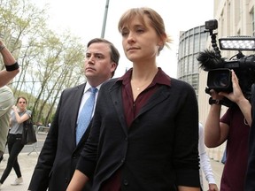 Actress Allison Mack departs the United States Eastern District Court after a bail hearing in relation to the sex trafficking charges filed against her on May 4, 2018 in the Brooklyn borough of New York City.