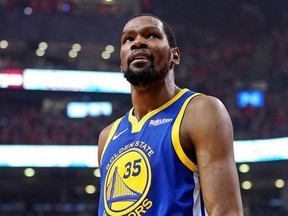 Golden State Warriors forward Kevin Durant reacts during the second quarter against the Toronto Raptors in Game 5 of the NBA Finals at Scotiabank Arena.