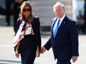U.S. President Donald Trump and First Lady Melania Trump arrive for their state visit to Britain, at Stansted Airport near London, June 3, 2019. REUTERS/Carlos Barria