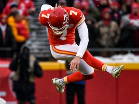 Harrison Butker of the Kansas City Chiefs begins a kick off against the Indianapolis Colts during the first quarter of the AFC Divisional Round playoff game at Arrowhead Stadium on Jan. 12, 2019 in Kansas City, Mo.