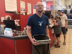 You can't get much more Canadian than buying a canoe with a briefcase full of Canadian Tire money. That's what Tomas Terfloth, shown here with his briefcase, did on Thursday in Saskatoon.