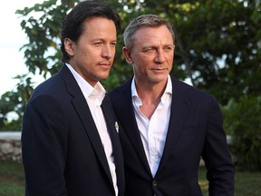 Bond director Cary Joji Fukunaga and actor Daniel Craig pose for a picture during a photocall for the British spy franchise's 25th film set for release next year, titled "Bond 25" in Oracabessa, Jamaica, on April 25, 2019.