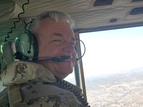 Brig.-Gen. Colin Keiver, shown in a this 2018 handout image provided by the Canadian Armed Forces helicopter, flying over Iraq.