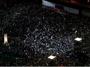 People gather for a vigil marking the 30th anniversary of the crackdown of Beijing's Tiananmen Square in 1989, at Victoria Park in Hong Kong, June 4, 2019.