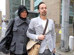 Jennifer and Jeromie Clark leave the Calgary Courts Centre on Oct. 1, 2018.