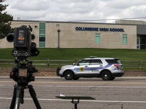 Police patrol outside Columbine High School on April 17, 2019 in Littleton, Colorado. (CHET STRANGE/AFP/Getty Images)