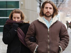 David and Collet Stephan leave for a break during their appeals trial in Calgary, Alta., Thursday, March 9, 2017. The medical examiner who conducted the autopsy on 19 month old Ezekiel Stephan told court that there's no question the toddler died of bacterial meningitis. Dr. Bamidele Adeagbo testified by video from Indiana at a voir dire at the trial of David and Collet Stephan who are facing a retrial trial for failing to provide the necessaries of life for their son.