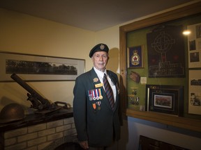 D-Day veteran Jim Parks, 94, poses for a photograph at the Mount Albert Legion in East Gwillimbury, Ont., on Thursday, May 30, 2019.