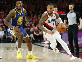 Damian Lillard of the Portland Trail Blazers dribbles the ball against the Golden State Warriors at Moda Center on May 20, 2019 in Portland. (Jonathan Ferrey/Getty Images)