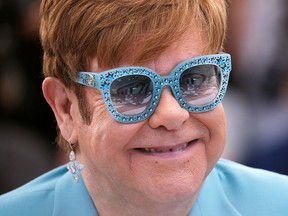Singer and producer Elton John poses during a photocall for the film "Rocketman" out of competition. (REUTERS/Stephane Mahe/File Photo)