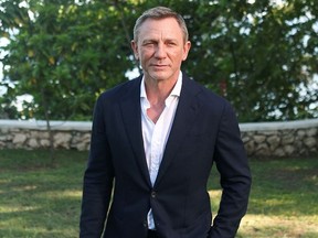 Actor Daniel Craig poses for a picture during a photocall for the British spy franchise's 25th film set for release next year, titled "Bond 25" in Oracabessa, Jamaica April 25, 2019.