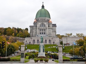 This October 17, 2010 photo shows Saint Joseph's Oratory basilica on the slopes of Montreal's Mount Royal in Montreal, Quebec, Canada. More than 1,000 Quebecers gathered Sunday at a Roman Catholic basilica in Montreal to watch their beloved Brother Andre enter the sainthood at the Vatican, calling it a "message of hope." The faithful crowded overnight into the Church of the Crypt at Saint Joseph's Oratory, transfixed by a large screen near the altar showing Pope Benedict XVI canonizing the first male saint born in Canada. Andre Bessette, who died in 1937 at the age of 91, is believed, according to his supporters, to have healed people by touching them or rubbing their bodies with oil from a lamp burning in front of a statue of Saint Joseph.