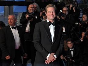 US actor Brad Pitt leaves follwing the screening of the film "Once Upon a Time... in Hollywood" at the 72nd edition of the Cannes Film Festival in Cannes, southern France, on May 21, 2019.