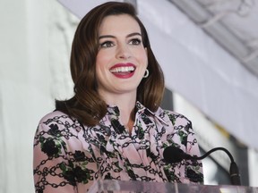 Anne Hathaway speaks on stage while being honoured with a star on the Hollywood Walk Of Fame on May 9, 2019 in Hollywood, Calif. (Rodin Eckenroth/Getty Images)