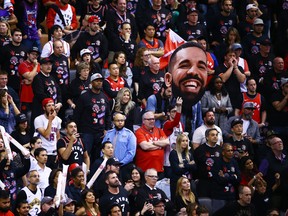 TORONTO, ONTARIO - MAY 30:  Toronto Raptors fans celebrate their teams 118-109 win over the Golden State Warriors during Game One of the 2019 NBA Finals at Scotiabank Arena on May 30, 2019 in Toronto, Canada.