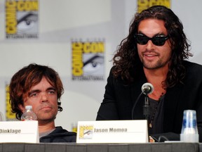 Actors Peter Dinklage, left, and Jason Momoa speak at HBO's "Game of Thrones" panel during Comic-Con 2011 on July 21, 2011 in San Diego, Calif.  (Frazer Harrison/Getty Images)