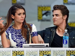 Actress Nina Dobrev and actor Paul Wesley attend CW's "The Vampire Diaries" panel during Comic-Con International 2014 at the San Diego Convention Center on July 26, 2014 in San Diego, Calif.  (Ethan Miller/Getty Images)