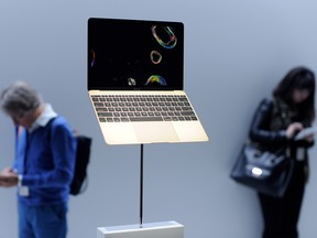 A new Macbook Pro is seen on display at an Apple media event in San Francisco, Calif. on March 9, 2015. (Josh Edelson/AFP/Getty Images)