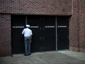 A cadet waits for the arrival of cadet candidates during the in-processing procedures during Reception Day at the United States Military Academy at West Point, June 27, 2016 in West Point, N.Y. (Drew Angerer/Getty Images)