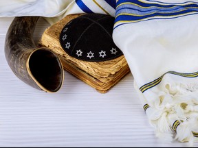 Rosh Hashanah Yom Kippur, shavuot, Hashana jewish New Year, Torah holiday concept with shofar traditional Israel's ram horn with religious holy prayer book