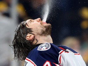 Sergei Bobrovsky of the Columbus Blue Jackets sprays water in the air before Game 5 against the Boston Bruins at TD Garden on May 4, 2019 in Boston. (Maddie Meyer/Getty Images)