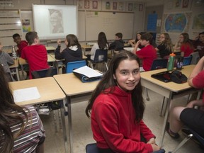A Grade 8 class at Clara Breton Public School wrote letters "home" from the perspective of actual soldiers that died on D-Day. Jasmine Murray (13) selected the soldier pictured, Frank Holmes of Winnipeg.