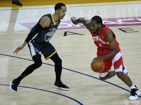 Golden State's Shaun Livingston (left) isn't too fussed about the Warriors' 3-1 deficit as of Sunday night. (Getty images)