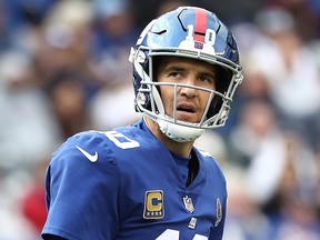 New York Giants quarterback Eli Manning walks off the field after failing to convert a first down in the fourth quarter against the Washington Redskins during their game at MetLife Stadium on Oct. 28, 2018 in East Rutherford, N.J.