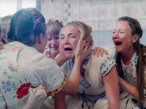 Florence Pugh, centre, stars in "Midsommar." (A24 photo)