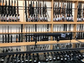 Firearms and accessories are displayed at Gun City gunshop in Christchurch, New Zealand, March 19, 2019.