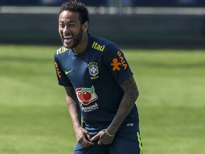 Neymar Jr. smiles during a training session of the Brazilian national football team at the squad's Granja Comary training complex on June 1, 2019 in Teresopolis, Brazil. (Buda Mendes/Getty Images)