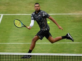 Australia's Nick Kyrgios in action during his second round match against Canada's Felix Auger Aliassime during the Fever-Tree Championships at the Queen's Club, in London, on Thursday, June 20, 2019.