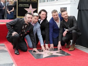 Chris Kirkpatrick, Lance Bass, JC Chasez, Joey Fatone and Justin Timberlake attend the NSYNC star ceremony on the Hollywood Walk of Fame on April 30, 2018.