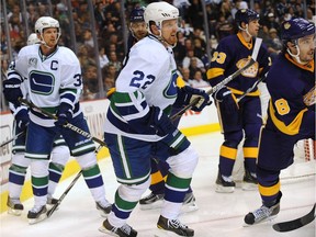 The Kings and Canucks wore throwback uniforms when they opened the 2010 season, calling back to the Canucks' inaugural home game in 1970.